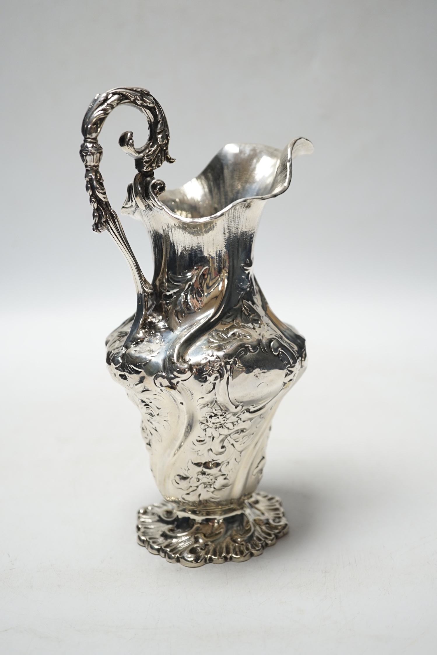 An ornate early Victorian silver cream jug, Charles Fox, London, 1838, 20.7cm, 9.8oz.